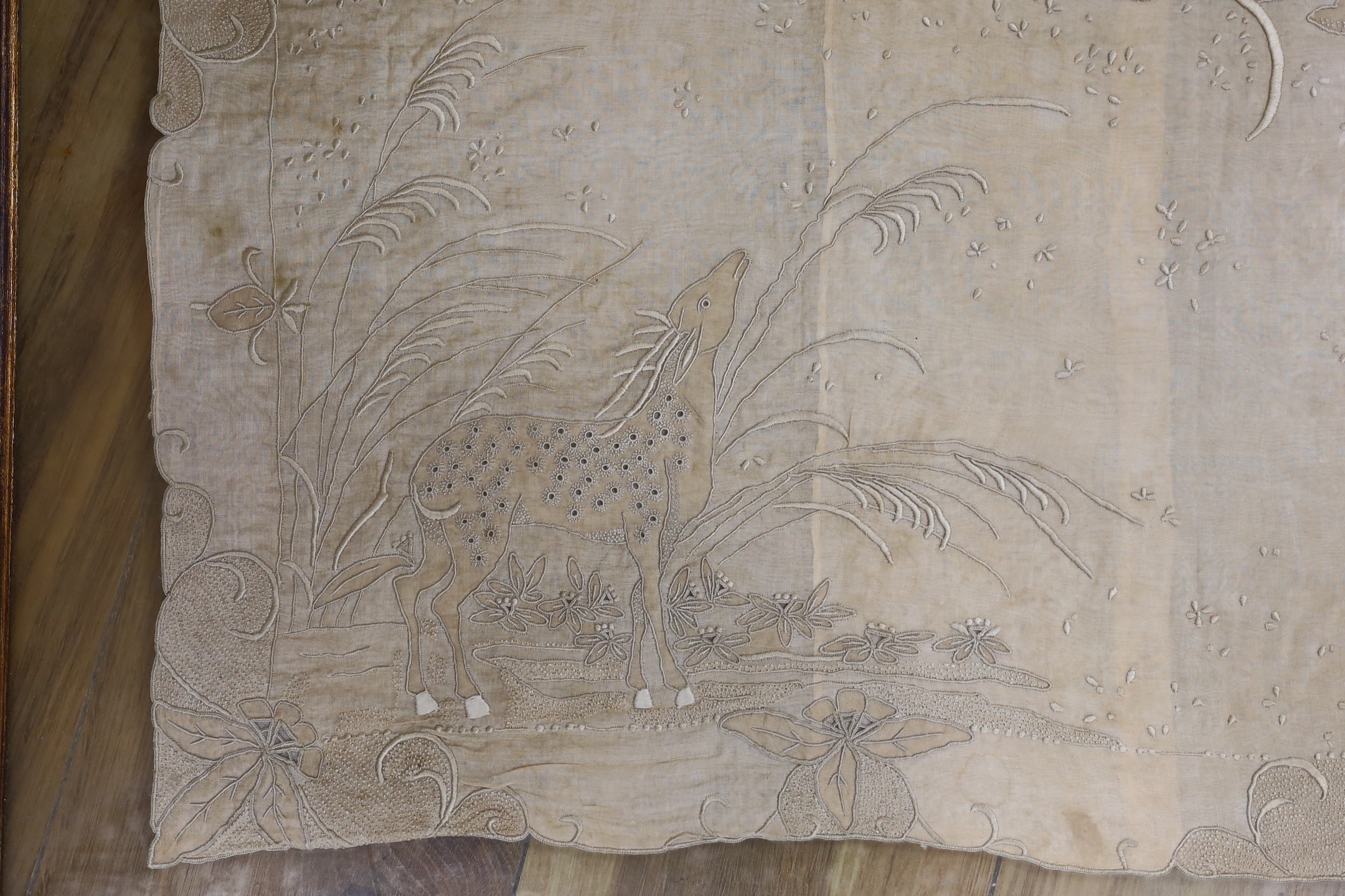 A framed embroidered silk panel, 48 cms wide x 38 cms high